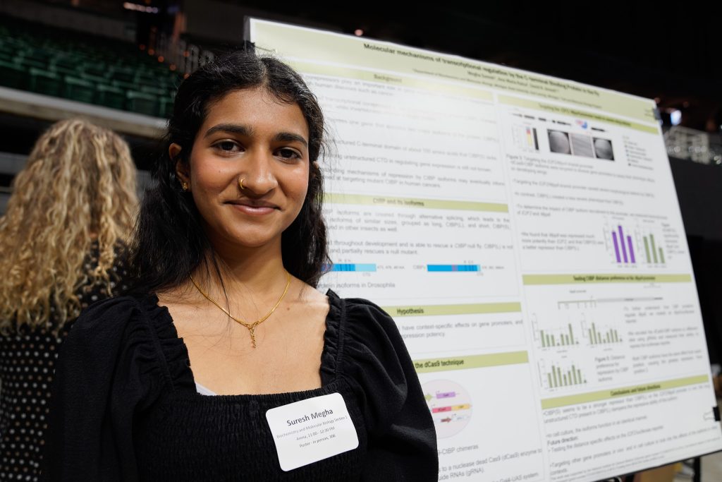 Biochemistry and Molecular Biology and Biotech second-year Megha Suresh in front of her UURAF poster on April 14, 2023.