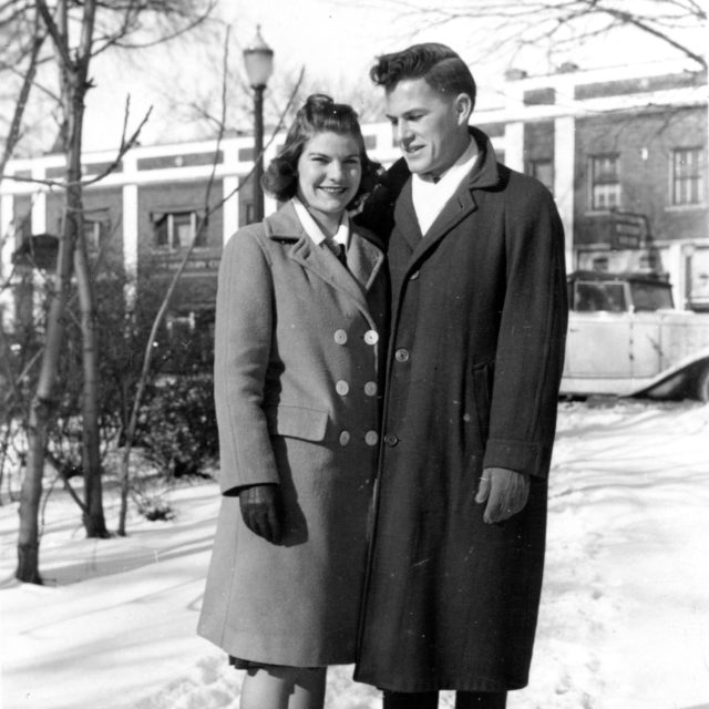 William and Mable Porteous stand together in the snow on Michigan State