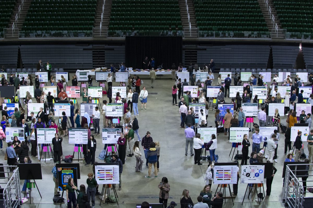 wide shot of the various student poster presentations at the Breslin Center for UURAF