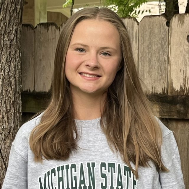 Abigail Aardema wearing an MSU, gray sweatshirt.