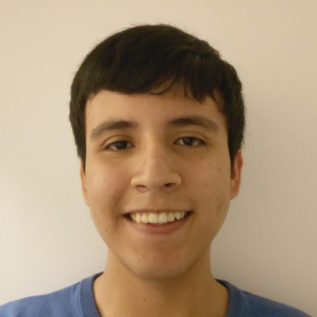 Juan Pablo Lozano Gonzalez profile photo wearing a blue shirt with a neutral beige background.