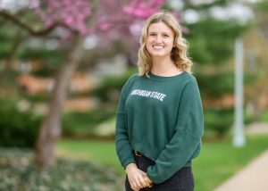 Delaney Jones headshot wearing MSU-branded clothing. 