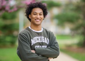 Jai Kozar-Lewis headshot wearing MSU-branded clothing. 