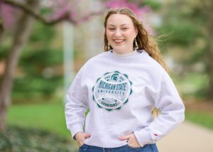 Kaylin Casper headshot wearing MSU-branded clothing. 