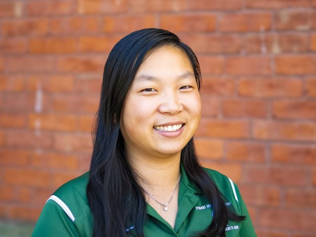Anna Lin Headshot in front of Eustace Cole Hall.